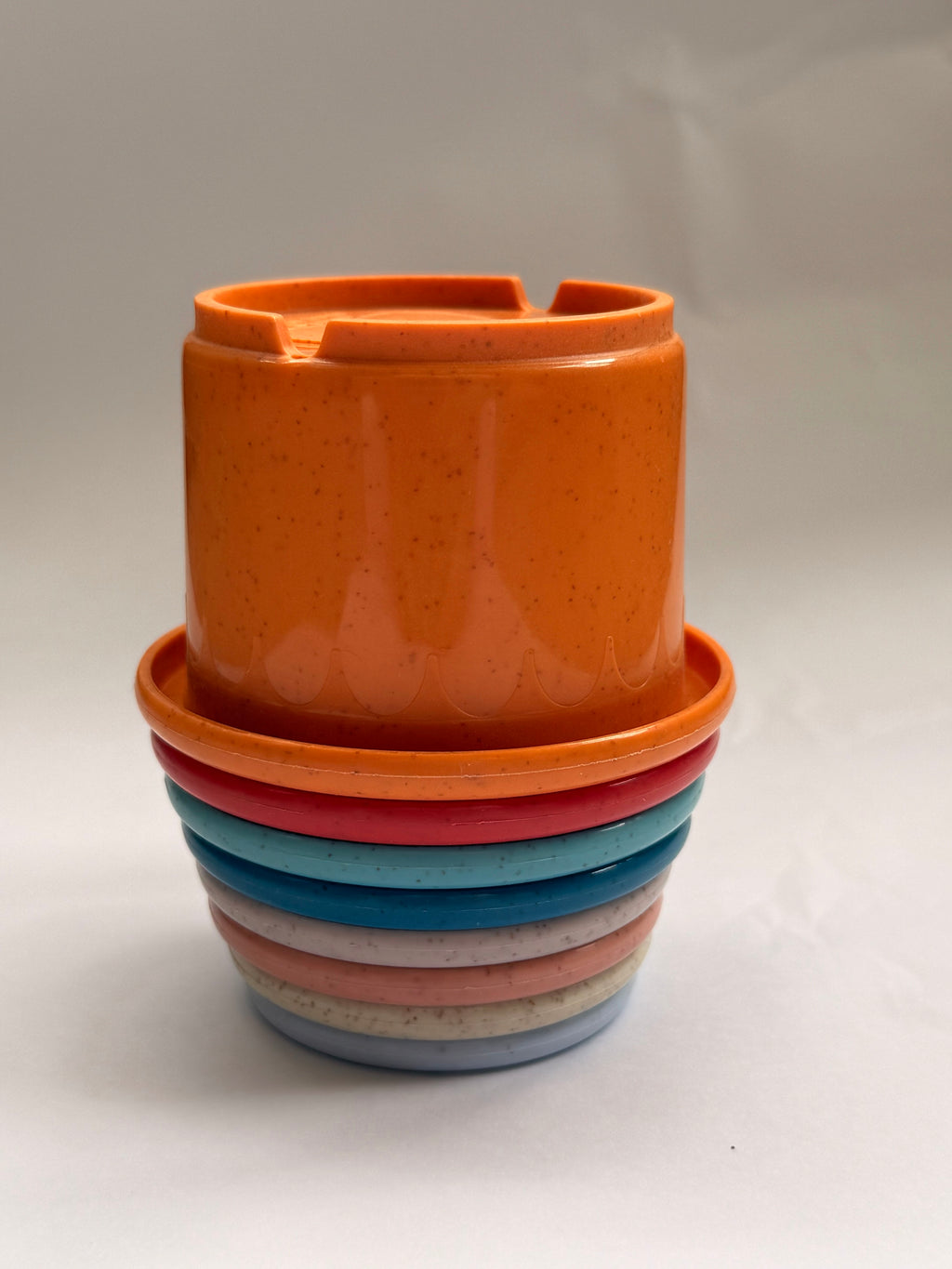 Novino stacking cups top view showing colorful animal face designs