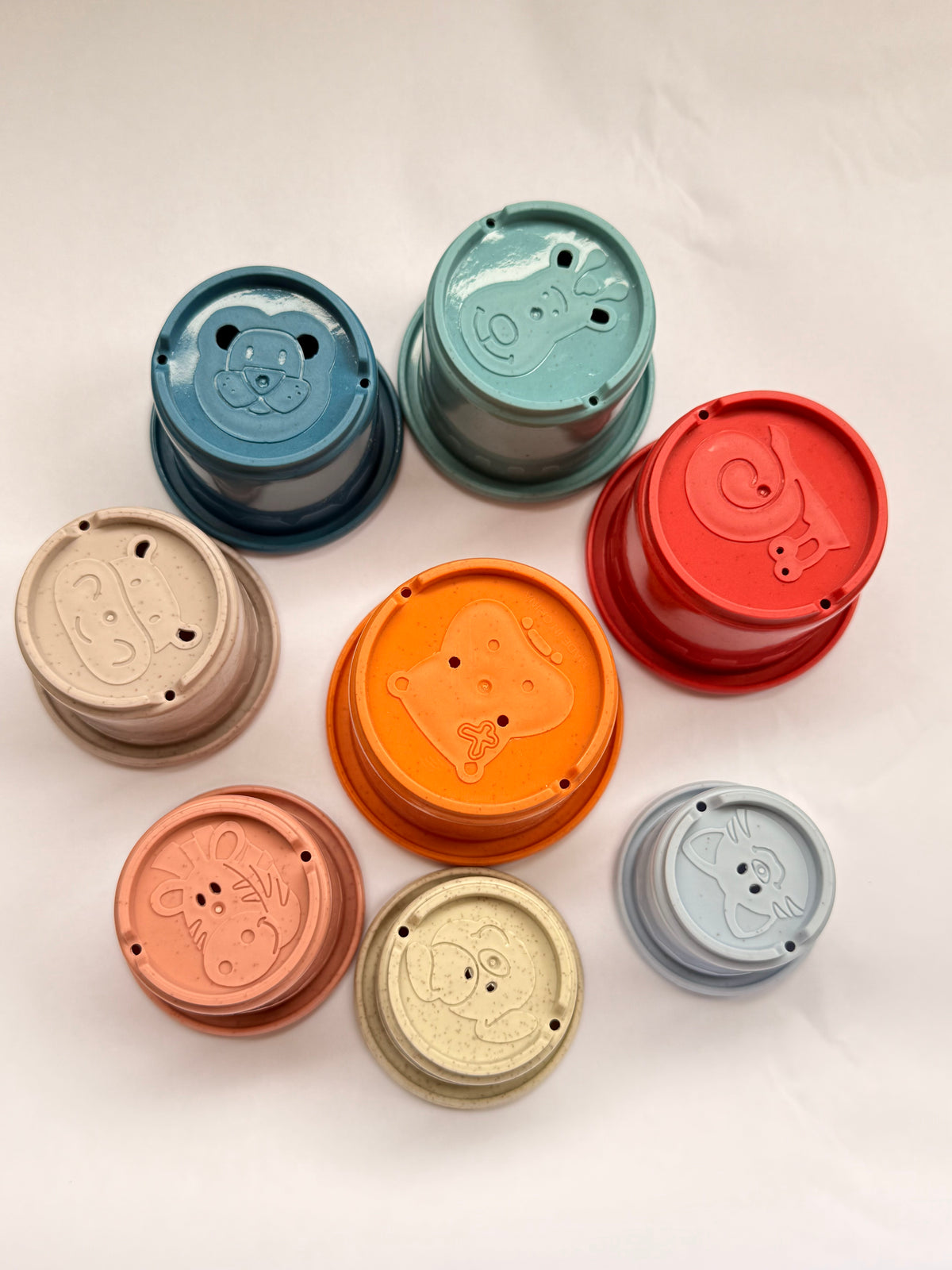 Novino stacking cups stacked upright showing rainbow of colors